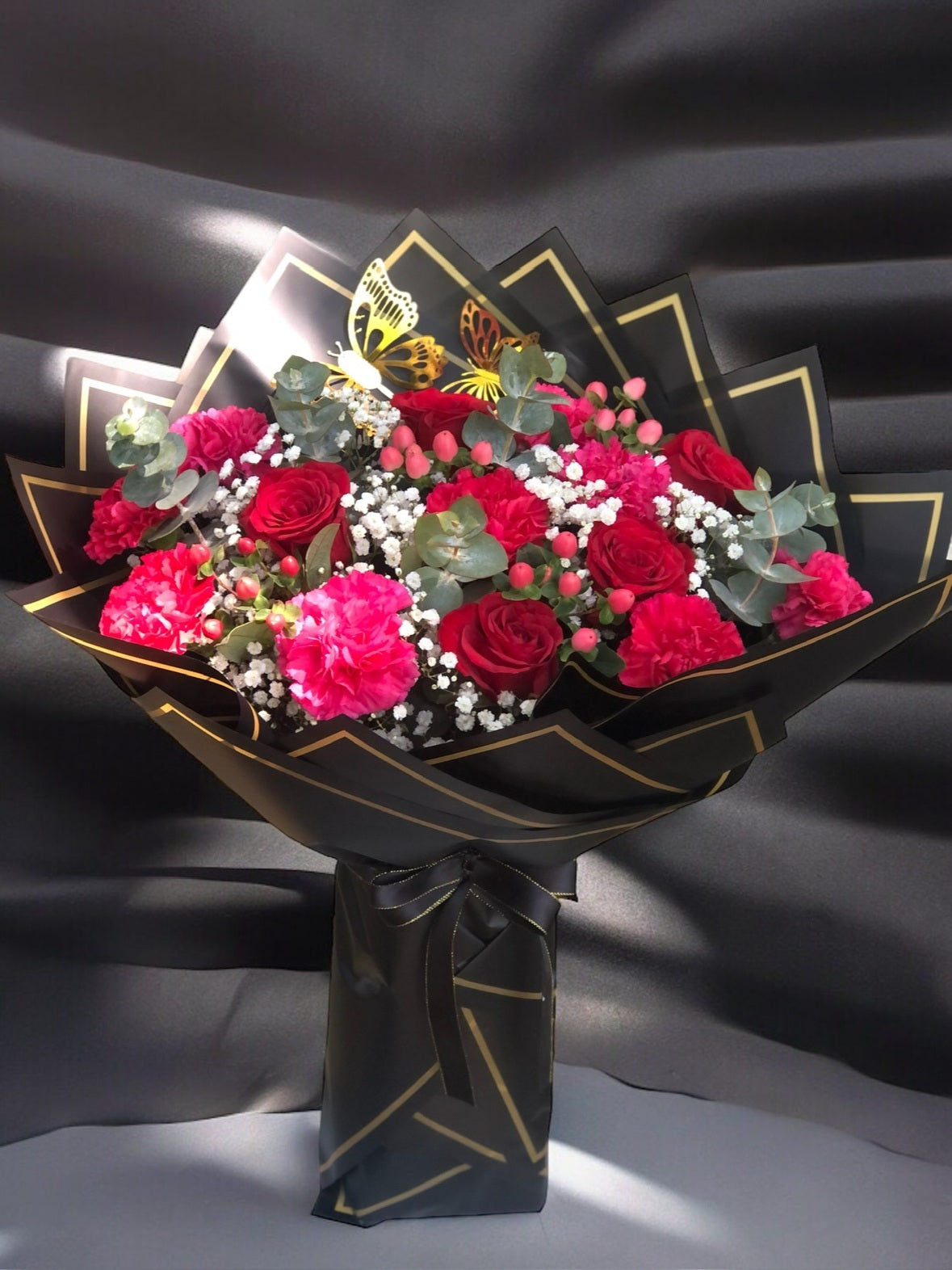 Berry Butterfly Standing Bouquet by LaDonna Flowers