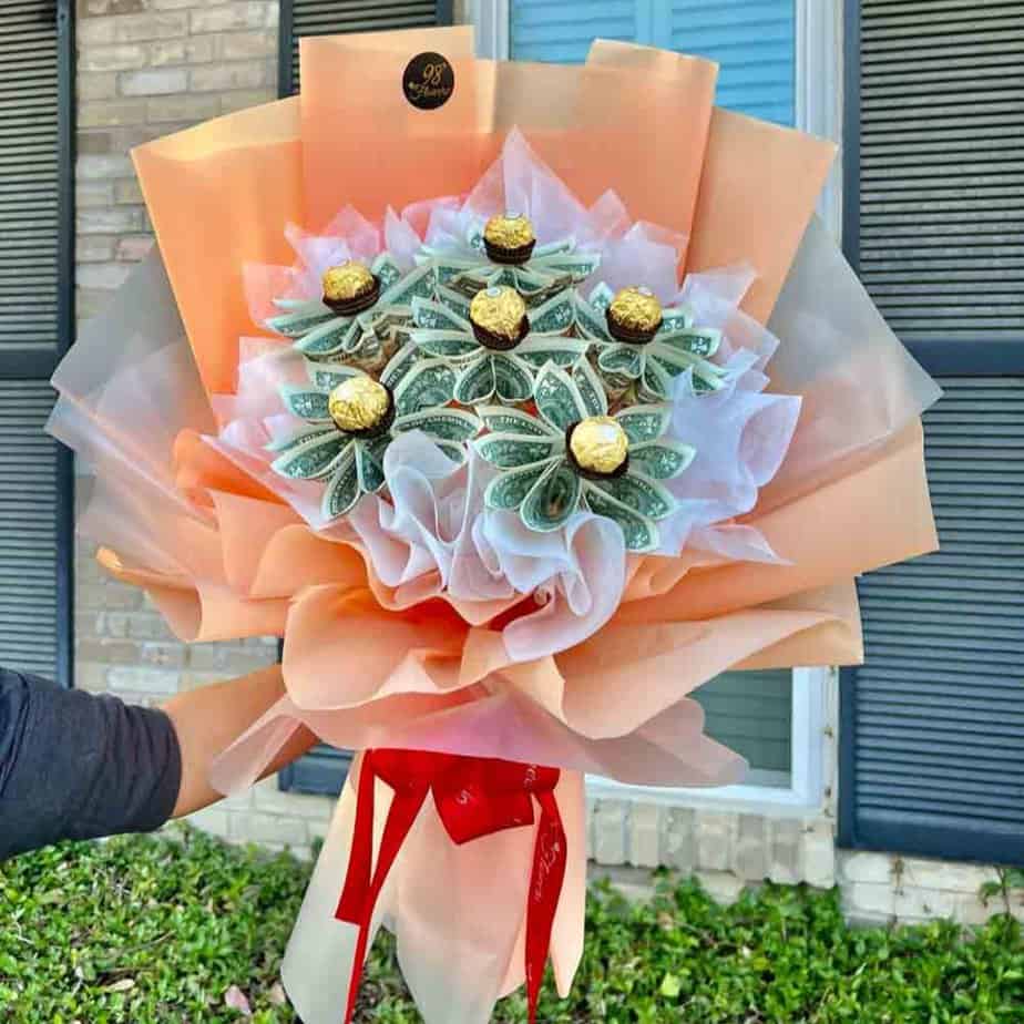 Handcrafted cash and chocolate money bouquet