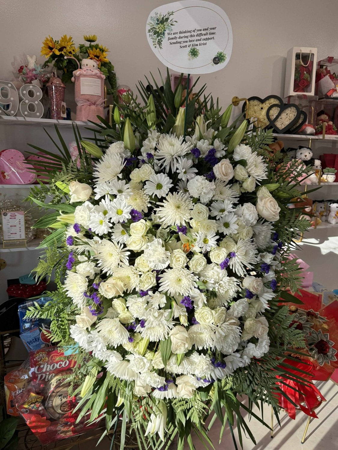 White and lavender sympathy standing wreath