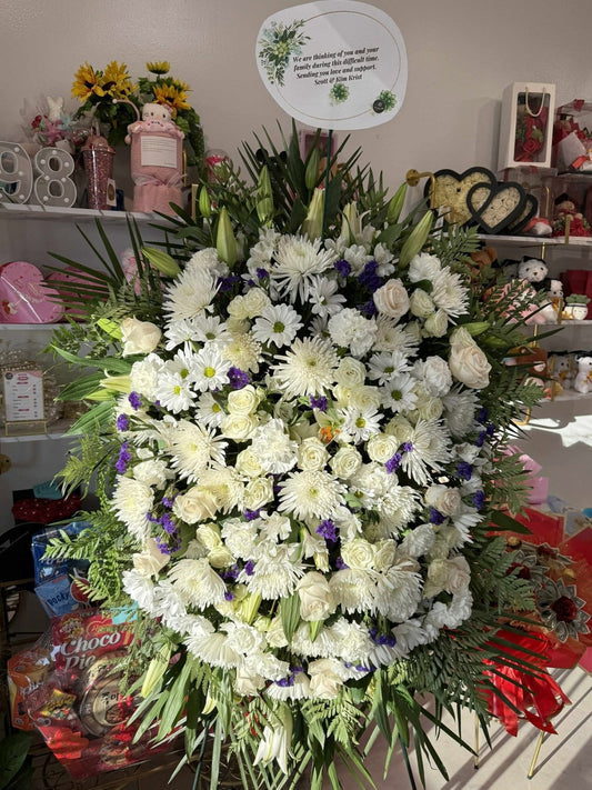 White and lavender sympathy standing wreath