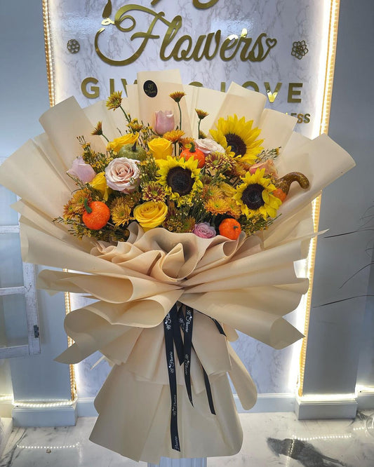 Sunflower and yellow rose fall bouquet