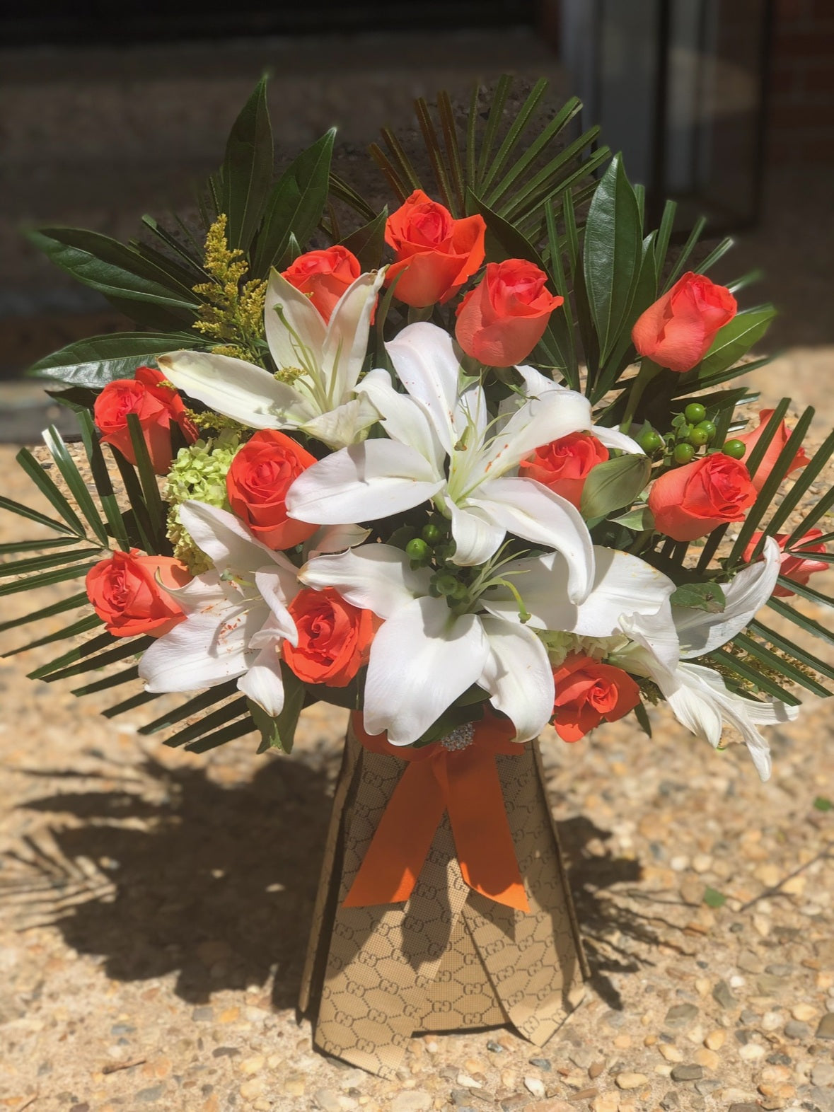 Orange Rose & White Lily Standing Bouquet by LaDonna Flowers