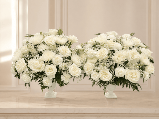 Coordinated white sympathy flower vase pair